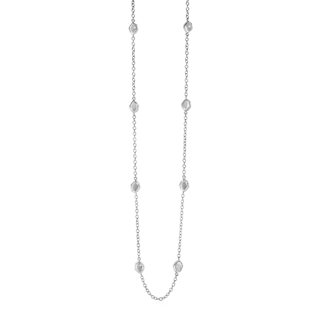 Station Necklace with Textured Beads in Sterling Silver